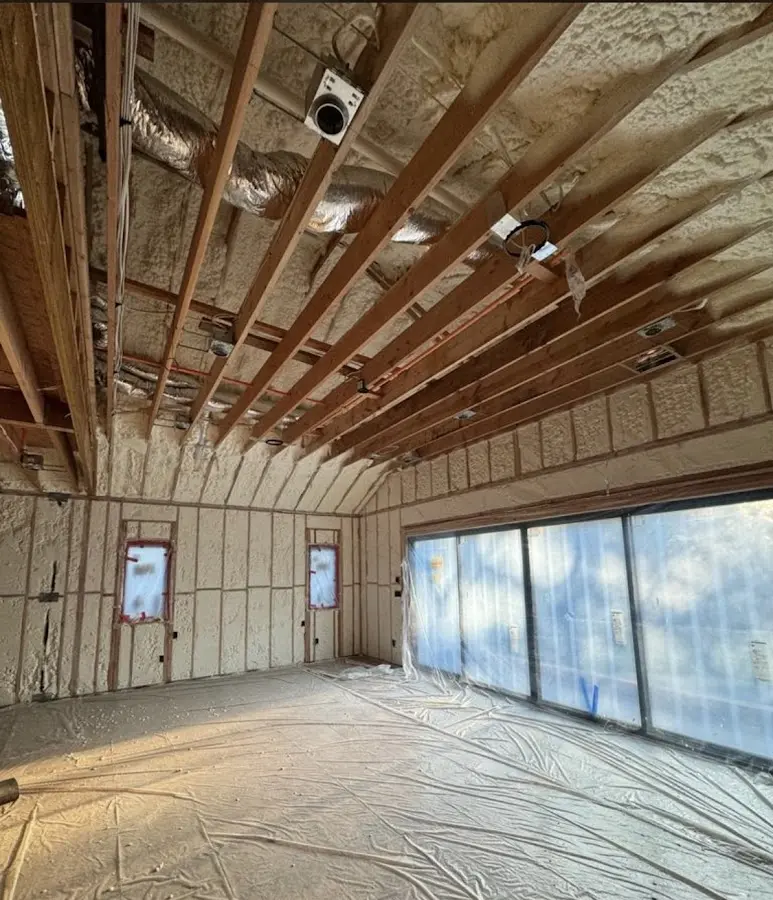 Interior walls and ceiling insulated with spray foam during new construction in Rutland